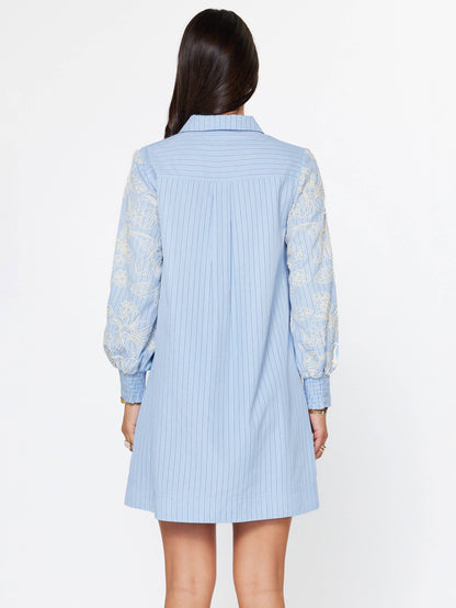 Current Air Eloise embroidered Misty Blue dress with floral details, flowing fabric, and elegant design for special occasions.