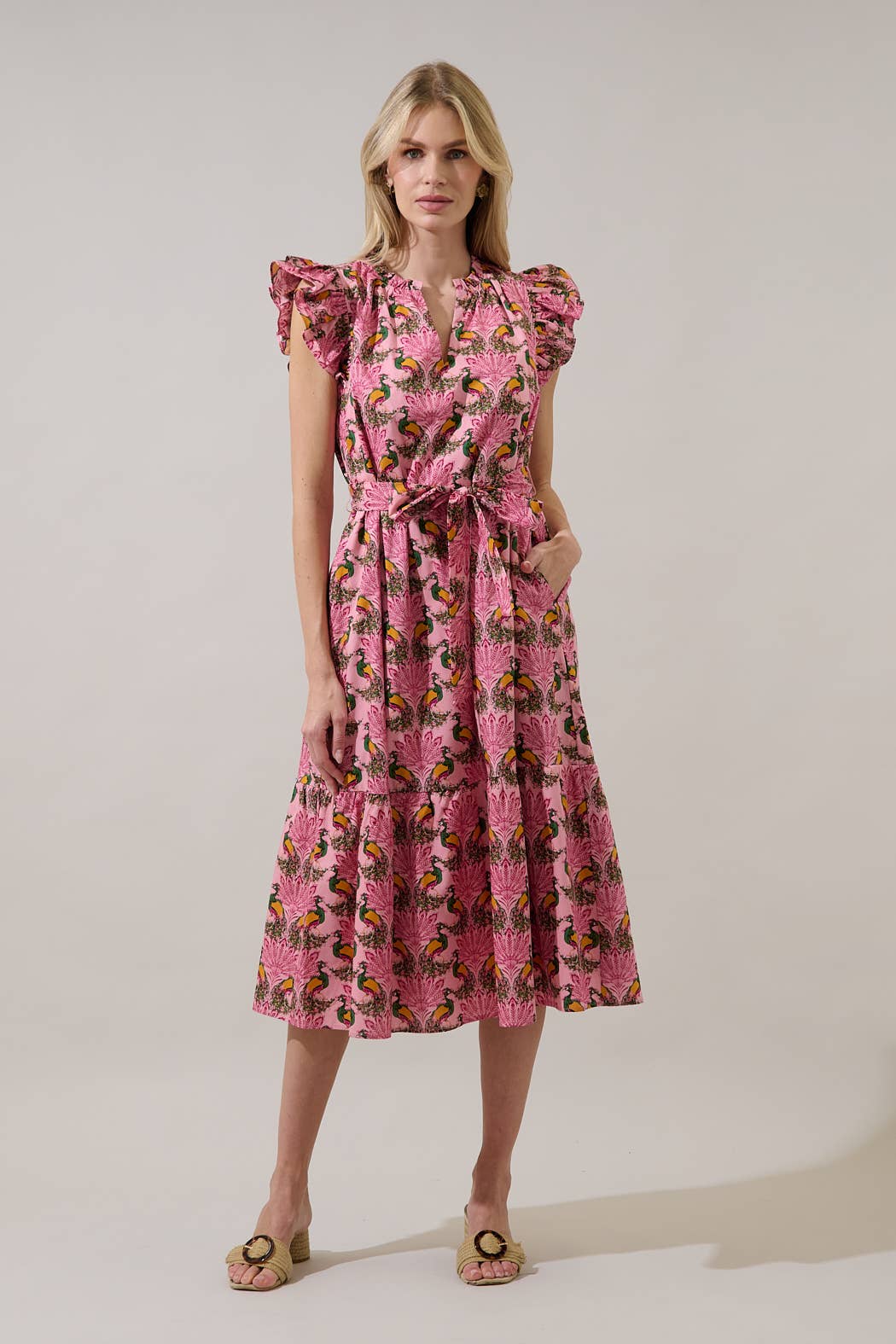 Sugarlips Peacock Bay Sita Ruffle Midi Dress with floral pattern, flowing fabric, and ruffled details, perfect for summer or special occasions.