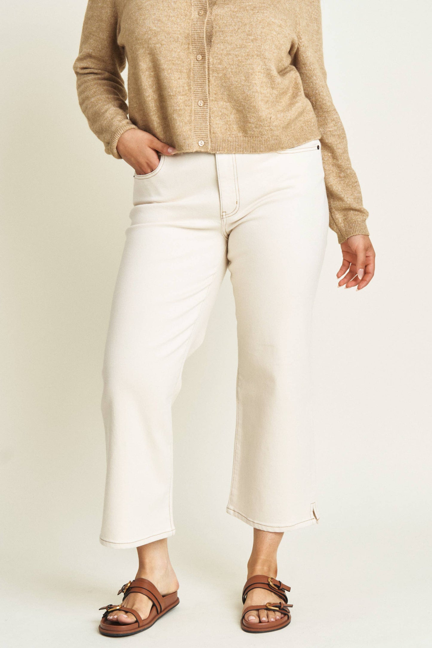 Oliver Logan Addington ankle crop mid-rise jean in ecru, showcasing the stylish bottoms with a relaxed fit and classic denim look.