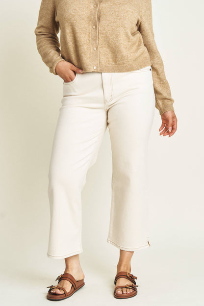 Oliver Logan Addington ankle crop mid-rise jean in ecru, showcasing the stylish bottoms with a relaxed fit and classic denim look.