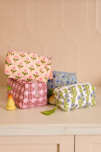 Pink Mona Blockprint makeup bag by Inner Child, featuring vibrant blockprint design, compact bag for cosmetics storage.