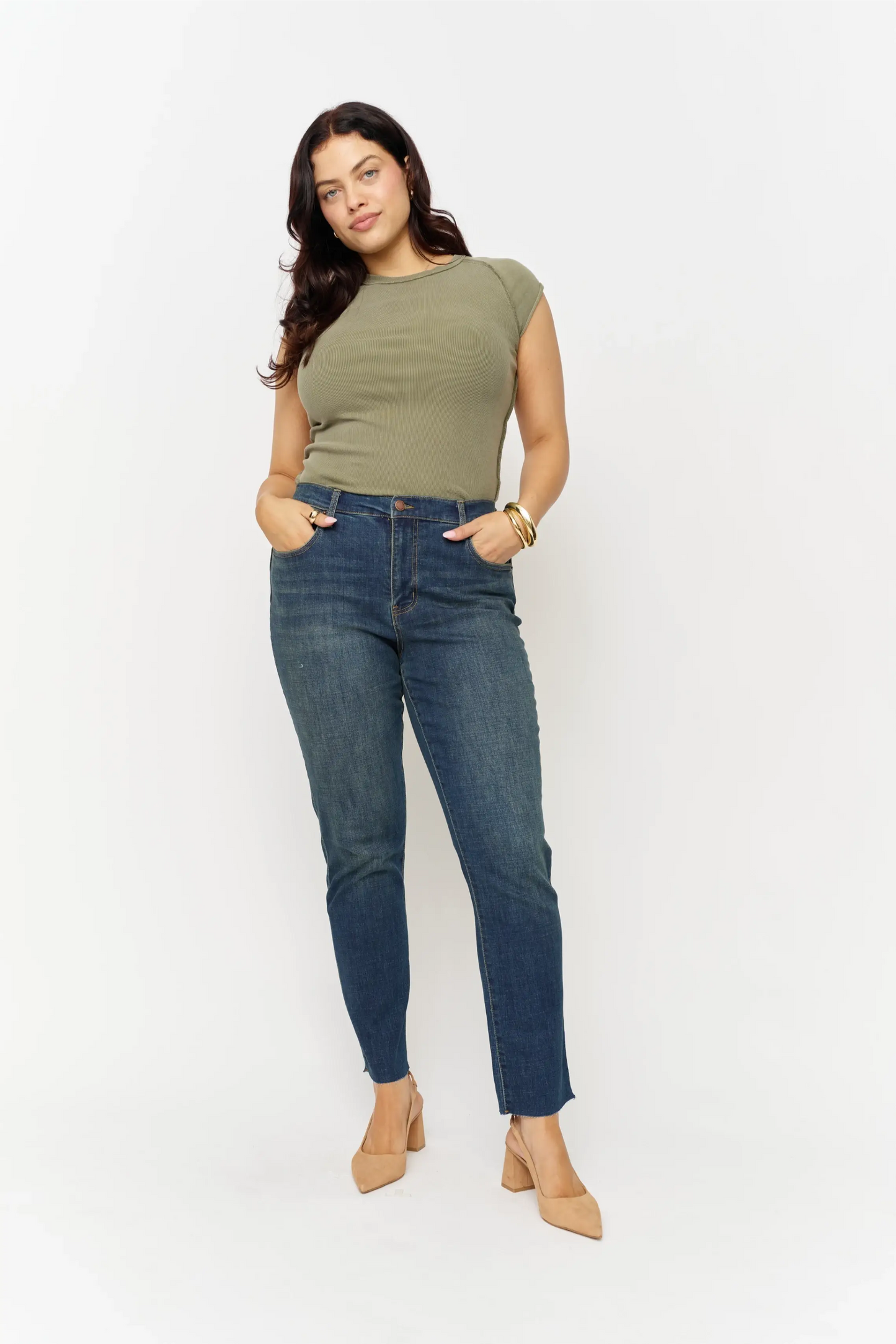 Oliver Logan Crosby Mid Rise Relaxed Taper Jean in standard wash, showing the casual fit and classic denim style.