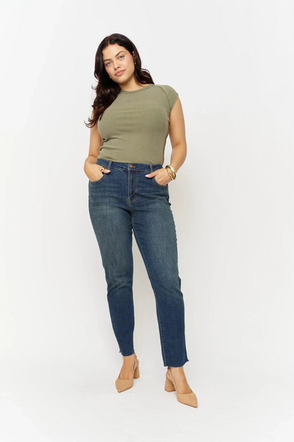 Oliver Logan Crosby Mid Rise Relaxed Taper Jean in standard wash, showing the casual fit and classic denim style.