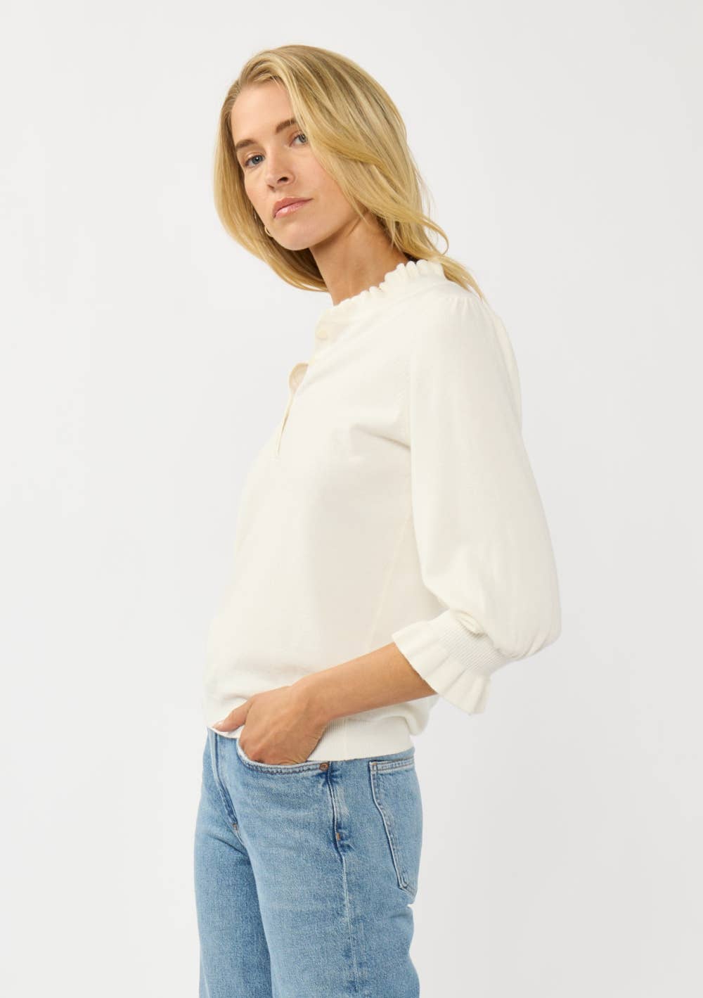 Cream Lovestitch Margot 3/4 sleeve button sweater top with relaxed fit and ribbed neckline, displayed on a hanger.