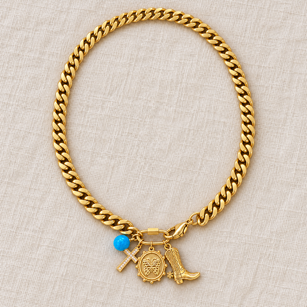 Texas butterfly and cross charm necklace flat lay