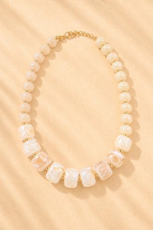 Milford chunky beaded necklace by Caroline Hill featuring natural-toned beads, stylish jewelry accessory for casual or elegant outfits.