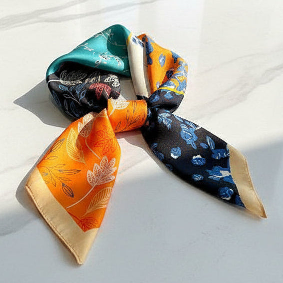Silk twilly scarf by UZ Wholesale Store featuring a double-sided design with vibrant patterns and luxurious fabric.