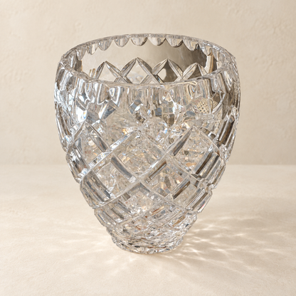 Cut Crystal Scalloped Vase on warm ivory background