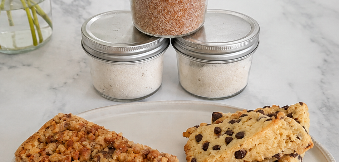 Little Miss T's Bakery treats and small-batch ingredients on a marble counter