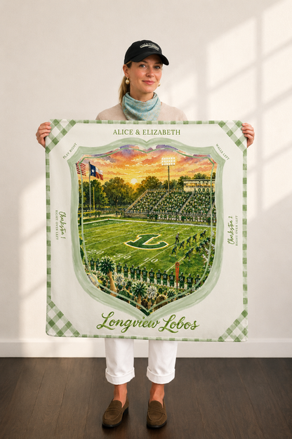 Woman holding the Longview Lobos mahjong mat