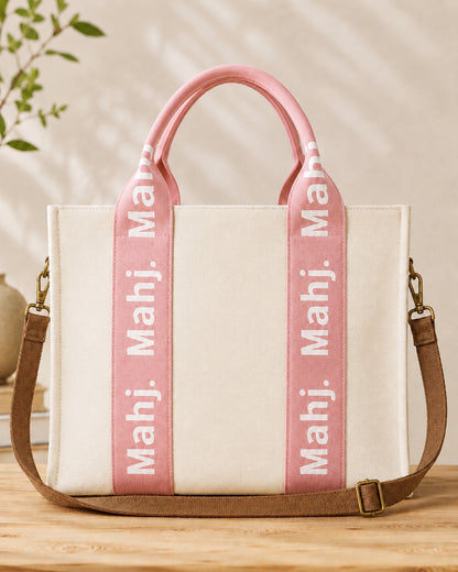 The Mahj Bag in Pink, front view with shoulder strap