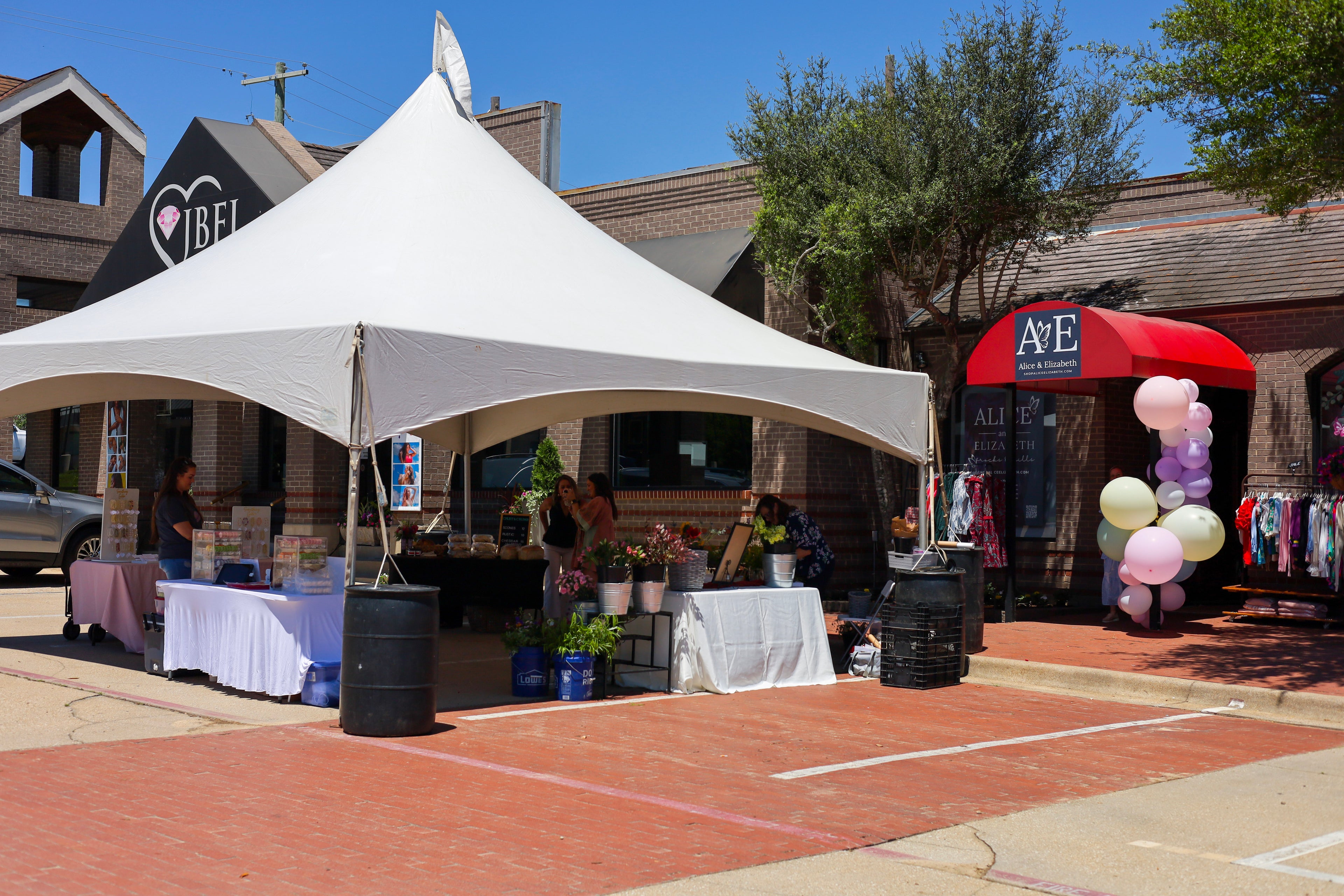 Alice & Elizabeth storefront with pop-up vendors